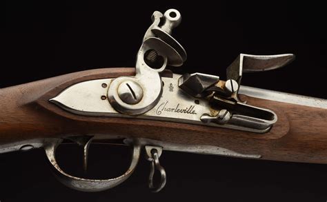 Introduced initially in 1763, the new French Infantry Musket underwent a number of changes 3 years later in 1766 including lightening the musket, reducing the size of the lock, and utilizing the button-head ramrod design. . 1766 charleville navy marine flintlocks for sale